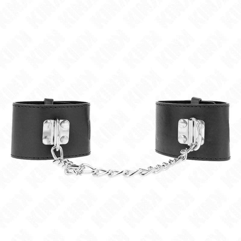 Imagen que nos facilita KINK WRIST RESTRAINT de su producto erótico KINK - MUÑEQUERAS FIJAS CON CADENA 30 CM Y CIERRE CANDADO NEGRO AJUSTABLE 16-23 CM X 5.5 CM para nuestra categoría "BDSM & BONDAGE |Bondage|Esposas de fijación".