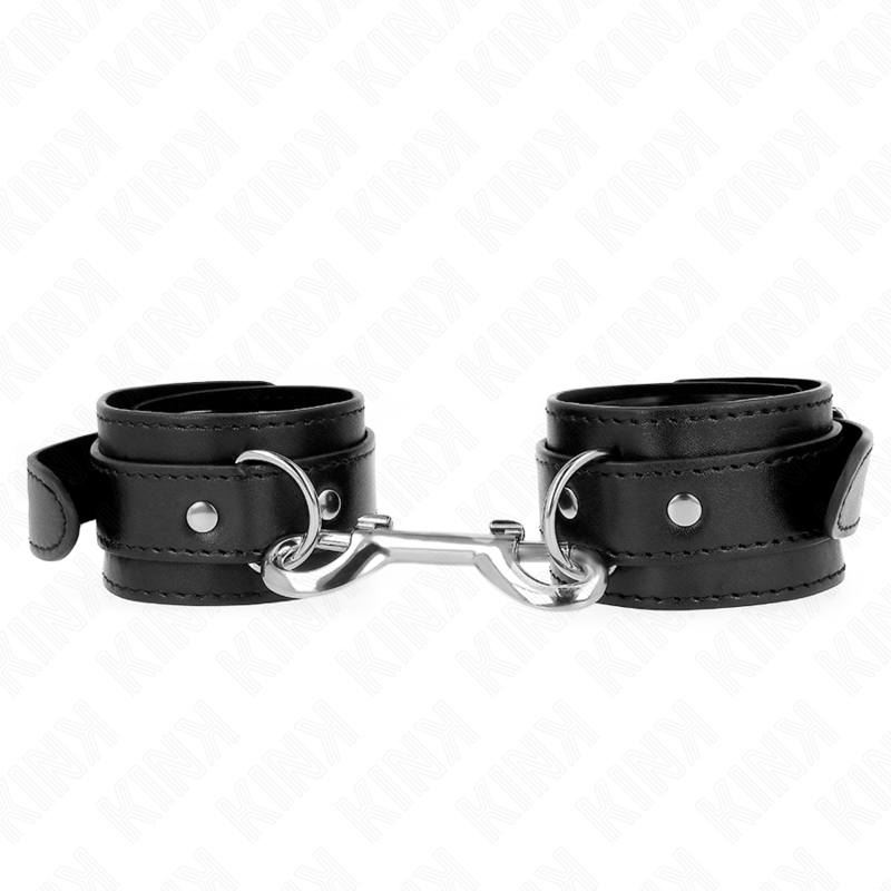 Imagen que nos facilita KINK WRIST RESTRAINT de su producto erótico KINK - MUÑEQUERAS SIMPLES CON FILA DE REMACHES NEGRO AJUSTABLE 17-28 CM X 5 CM para nuestra categoría "BDSM & BONDAGE |Bondage|Esposas de fijación".