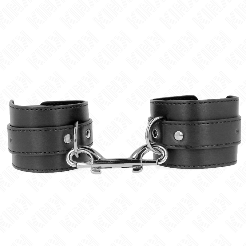 Imagen que nos facilita KINK WRIST RESTRAINT de su producto erótico KINK - MUÑEQUERAS SIMPLES CON FILA DE REMACHES Y HEBILLA GRANDE NEGRO AJUSTABLE 17-28 CM X 5 CM para nuestra categoría "BDSM & BONDAGE |Bondage|Esposas de fijación".