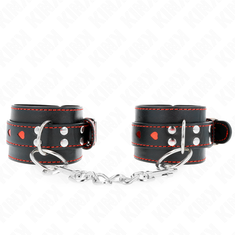 Imagen que nos facilita KINK WRIST RESTRAINT de su producto erótico KINK - MUÑEQUERAS NEGRO CON INCRUSTACIÓN DE CORAZÓN ROJO AJUSTABLE 21-28 CM X 5.5 CM para nuestra categoría "BDSM & BONDAGE |Bondage|Esposas de fijación".