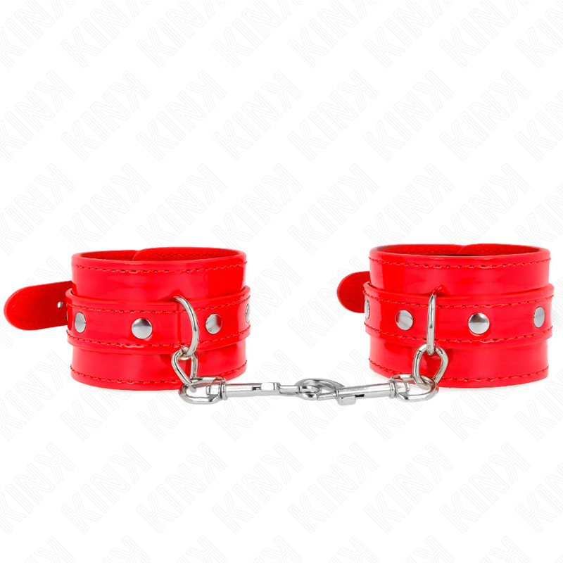 Imagen que nos facilita KINK WRIST RESTRAINT de su producto erótico KINK - MUÑEQUERAS CON TACHUELAS ROJO AJUSTABLE 23-33 CM para nuestra categoría "BDSM & BONDAGE |Bondage|Esposas de fijación".