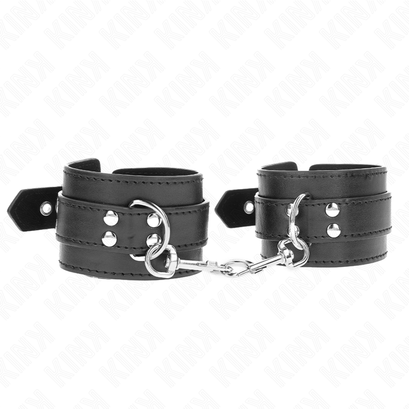 Imagen que nos facilita KINK WRIST RESTRAINT de su producto erótico KINK - MUÑEQUERAS CON TACHUELAS NEGRO 35 X 6 CM para nuestra categoría "BDSM & BONDAGE |Bondage|Esposas de fijación".